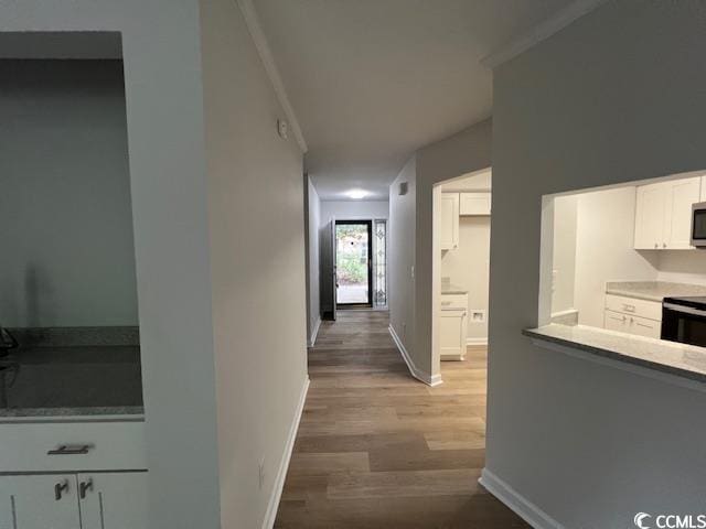 116 Hickory Dr, Conway, SC 29526 - hallway with ornamental molding, baseboards, and wood finished floors