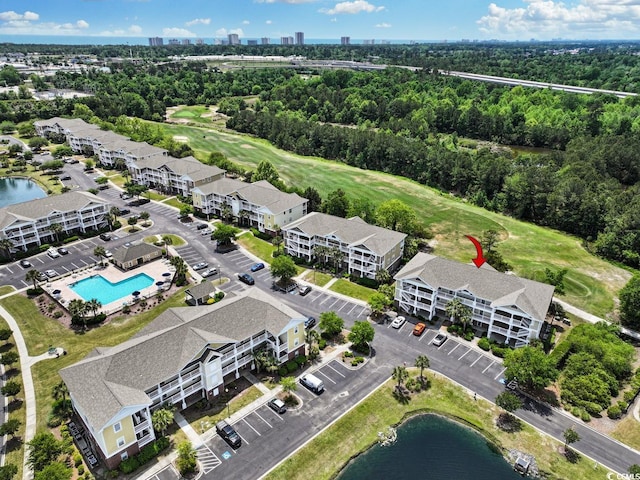 aerial view with a water view and golf course view