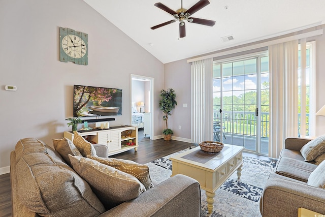 living area featuring baseboards, a ceiling fan, wood finished floors, and visible vents
