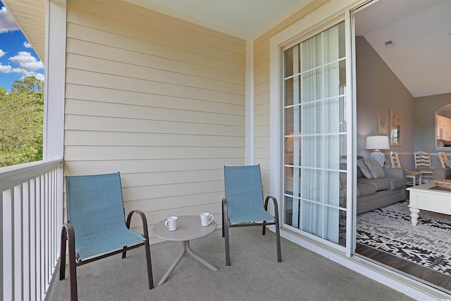 balcony featuring visible vents