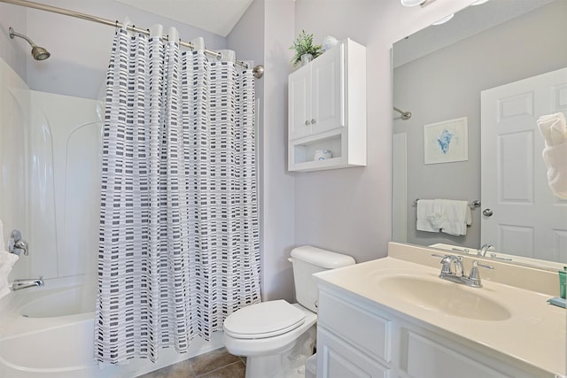 bathroom featuring vanity, tile patterned floors, toilet, and shower / bath combination with curtain