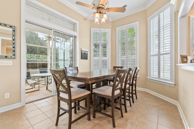 127 Willow Bay Dr, Murrells Inlet, SC 29576 - dining area with crown molding, ceiling fan, baseboards, and light tile patterned floors