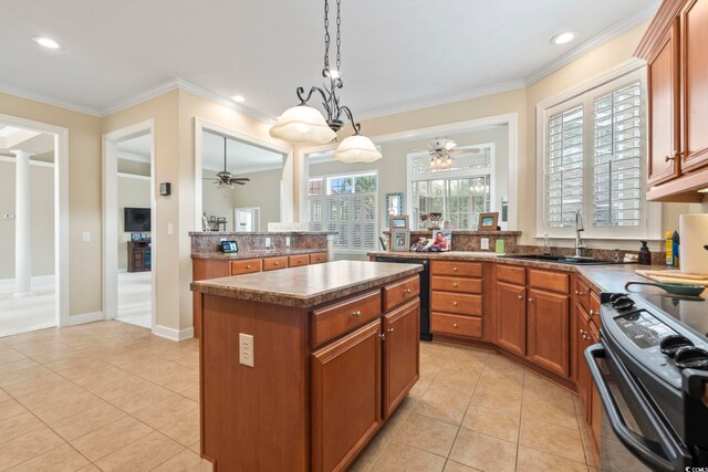 127 Willow Bay Dr, Murrells Inlet, SC 29576 - kitchen featuring a sink, brown cabinetry, a center island, a ceiling fan, and black appliances