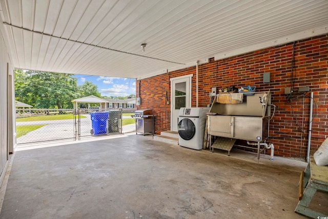 153 Busbee St, Conway, SC 29526 - view of patio with washer / clothes dryer, area for grilling, an attached carport, a gate, and fence