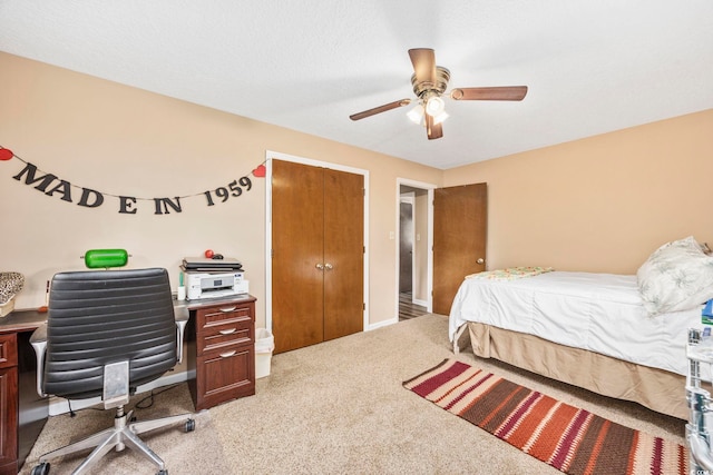 153 Busbee St, Conway, SC 29526 - bedroom with light colored carpet, an office area, ceiling fan, a closet, and baseboards