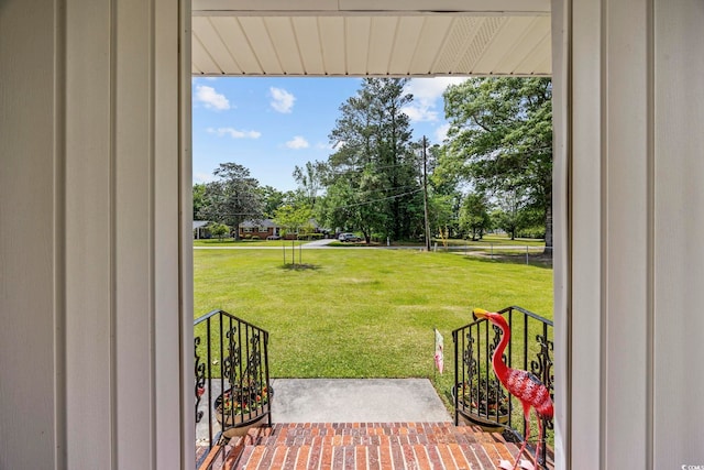 153 Busbee St, Conway, SC 29526 - doorway featuring view of wooded area