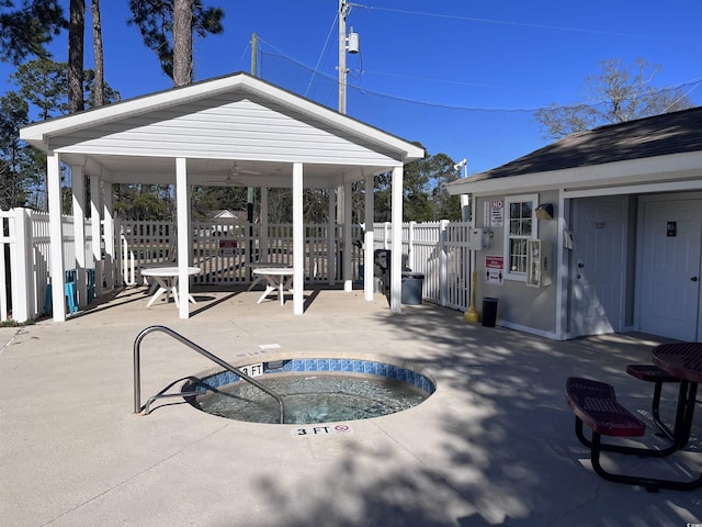 view of patio with a gazebo and fence