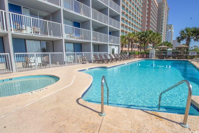 community pool with a patio