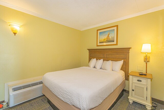 bedroom with baseboards and ornamental molding