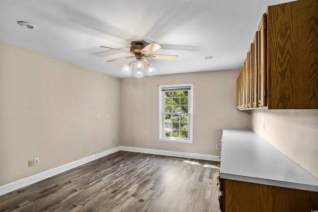 7602 Glenwood Dr, Myrtle Beach, SC 29572 - unfurnished room with a ceiling fan and dark wood-type flooring