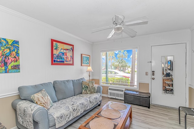 4516 Seaview St Unit 135, North Myrtle Beach, SC 29582 - living room with light wood-style floors, crown molding, a wall mounted air conditioner, and a ceiling fan