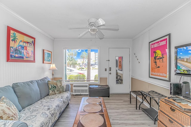 4516 Seaview St Unit 135, North Myrtle Beach, SC 29582 - living room with light wood-type flooring, ceiling fan, ornamental molding, and an AC wall unit