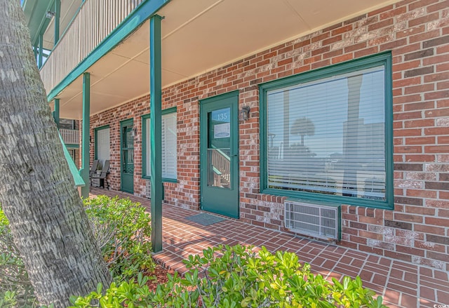 4516 Seaview St Unit 135, North Myrtle Beach, SC 29582 - entrance to property featuring brick siding and a porch