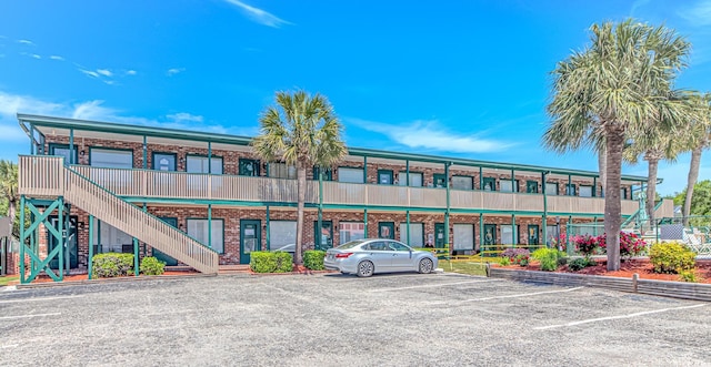 4516 Seaview St Unit 135, North Myrtle Beach, SC 29582 - view of commercial location with uncovered parking and stairway