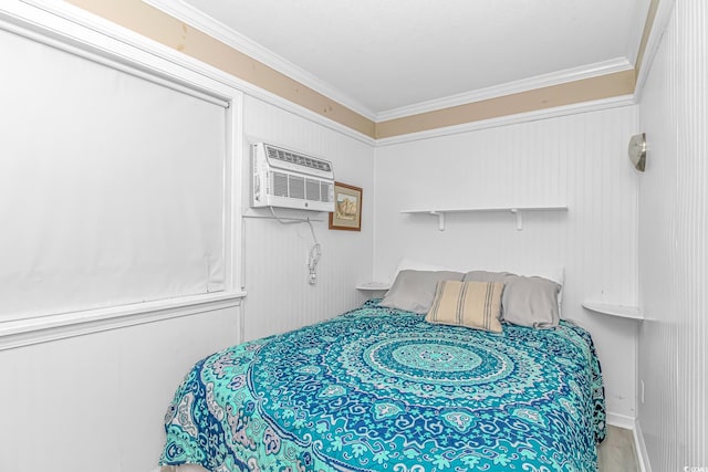 4516 Seaview St Unit 135, North Myrtle Beach, SC 29582 - bedroom featuring ornamental molding and a wall mounted AC