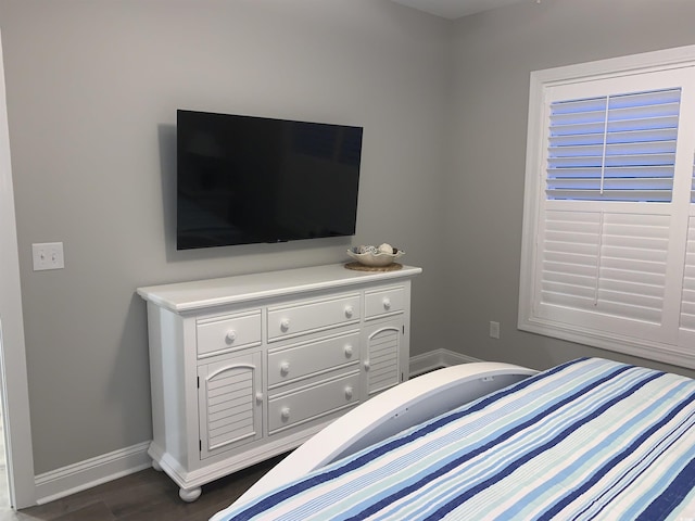223 S 9th Ave S, North Myrtle Beach, SC 29582 - bedroom featuring baseboards and dark wood-style flooring