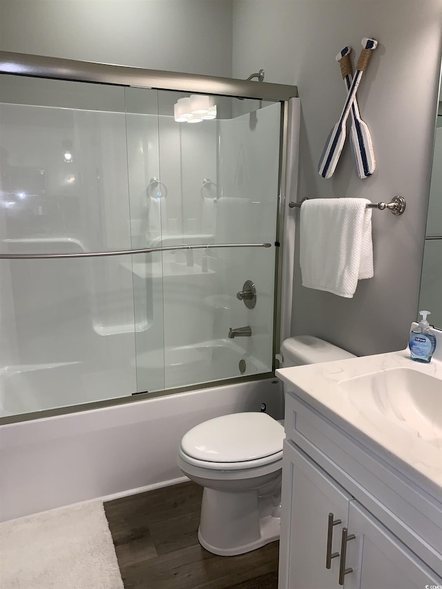 223 S 9th Ave S, North Myrtle Beach, SC 29582 - full bath with wood finished floors, vanity, and bath / shower combo with glass door