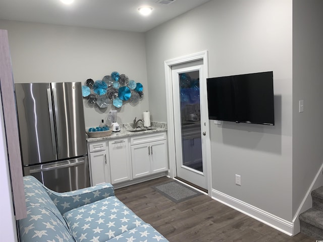 223 S 9th Ave S, North Myrtle Beach, SC 29582 - bar area with freestanding refrigerator, dark wood finished floors, and stairs