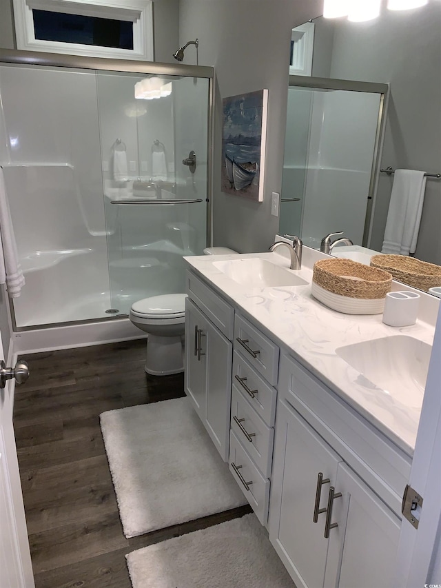 223 S 9th Ave S, North Myrtle Beach, SC 29582 - full bath featuring wood finished floors, a shower stall, and double vanity