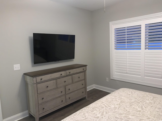 223 S 9th Ave S, North Myrtle Beach, SC 29582 - bedroom with dark wood-style flooring and baseboards