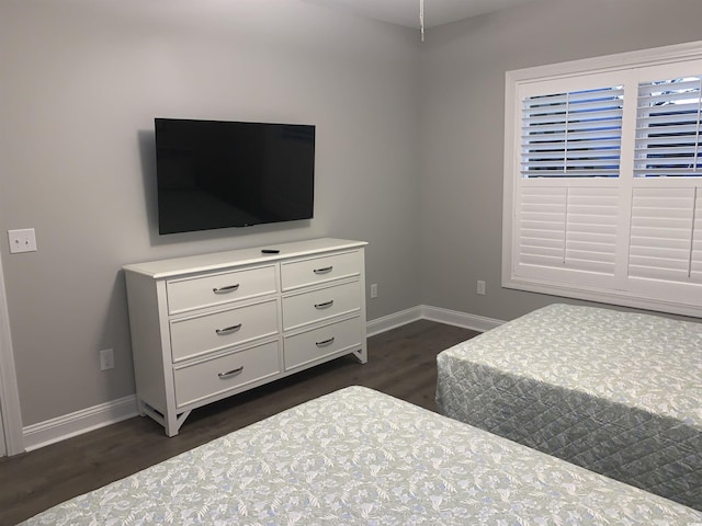223 S 9th Ave S, North Myrtle Beach, SC 29582 - bedroom with dark wood-style floors and baseboards