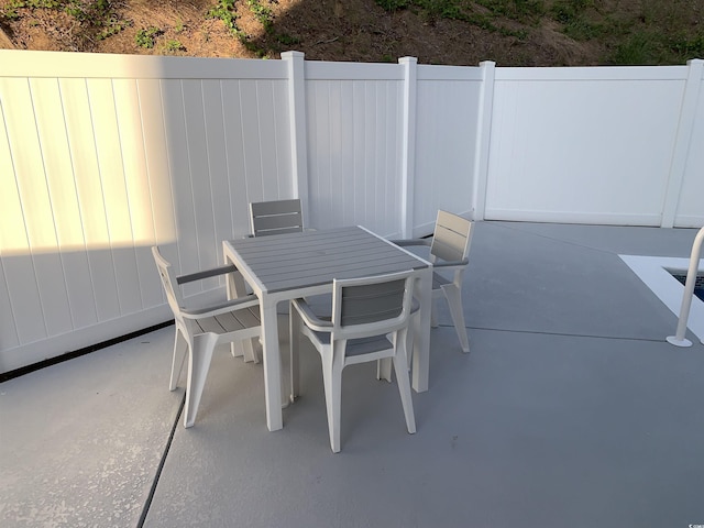 223 S 9th Ave S, North Myrtle Beach, SC 29582 - view of patio with outdoor dining area