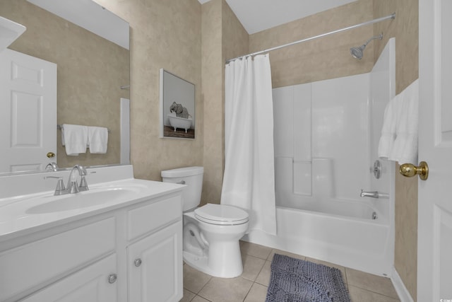 full bathroom featuring tile patterned floors, shower / bath combo, vanity, and toilet