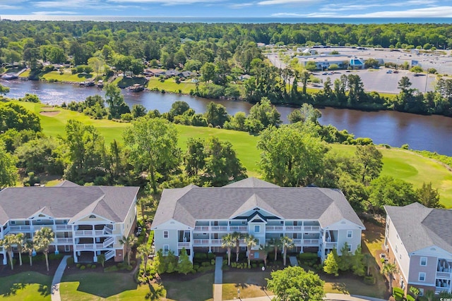 bird's eye view with view of golf course and a water view