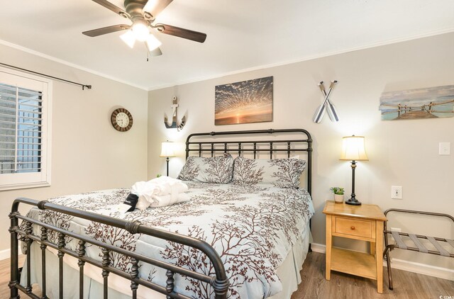 5523 N Ocean Blvd Unit 1201, Myrtle Beach, SC 29577 - bedroom featuring wood finished floors, crown molding, and a ceiling fan