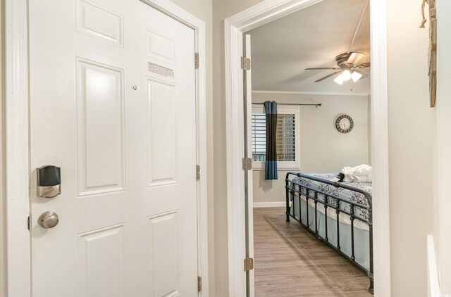 5523 N Ocean Blvd Unit 1201, Myrtle Beach, SC 29577 - hall with light wood-style flooring and ornamental molding