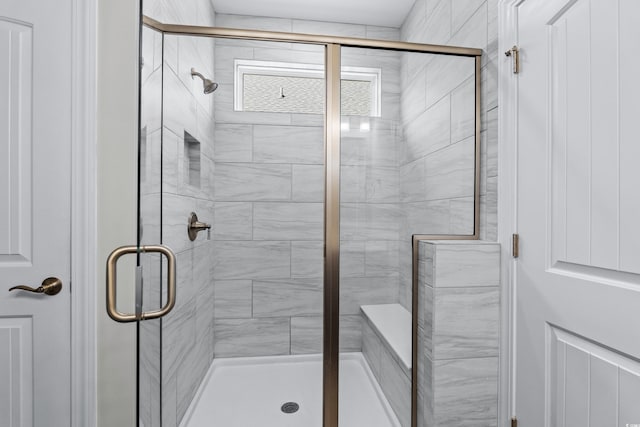 full bathroom featuring a stall shower