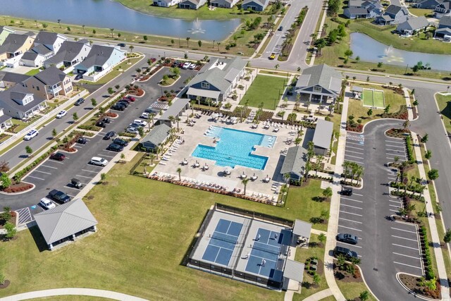 aerial view with a residential view and a water view
