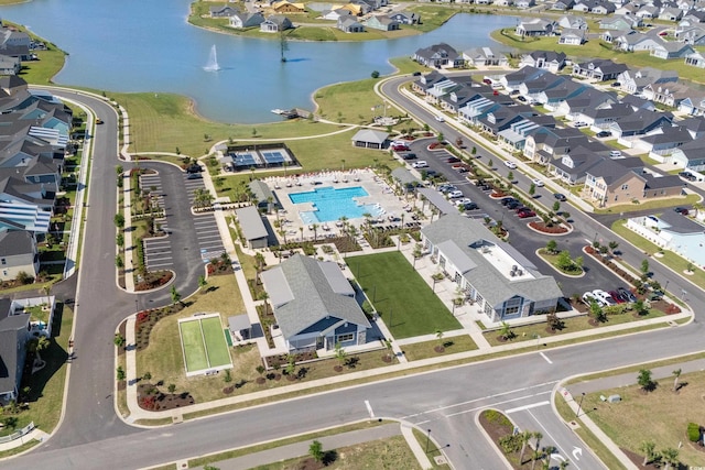aerial view featuring a water view and a residential view