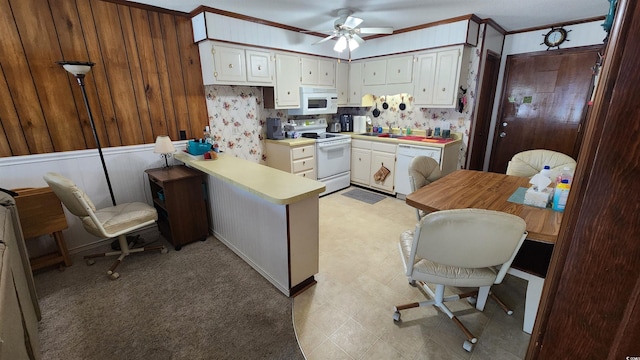 9540 Shore Dr Unit 1N, Myrtle Beach, SC 29572 - kitchen with white appliances, light countertops, a peninsula, ceiling fan, and a sink