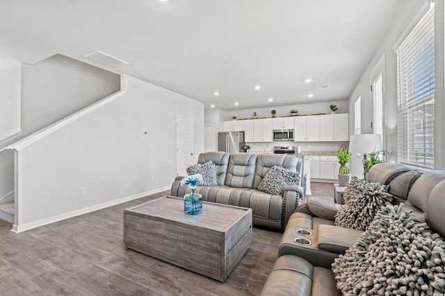 3968 Hibiscus Dr, Little River, SC 29566 - living area featuring recessed lighting, wood finished floors, and baseboards