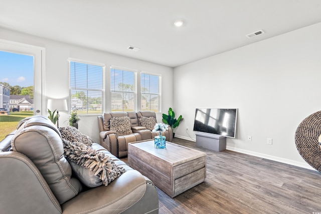 3968 Hibiscus Dr, Little River, SC 29566 - living room with dark wood-style floors, baseboards, and recessed lighting