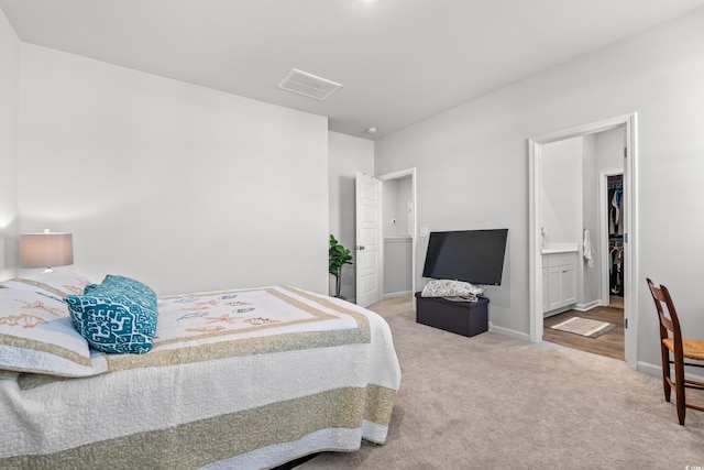 3968 Hibiscus Dr, Little River, SC 29566 - carpeted bedroom featuring baseboards and connected bathroom
