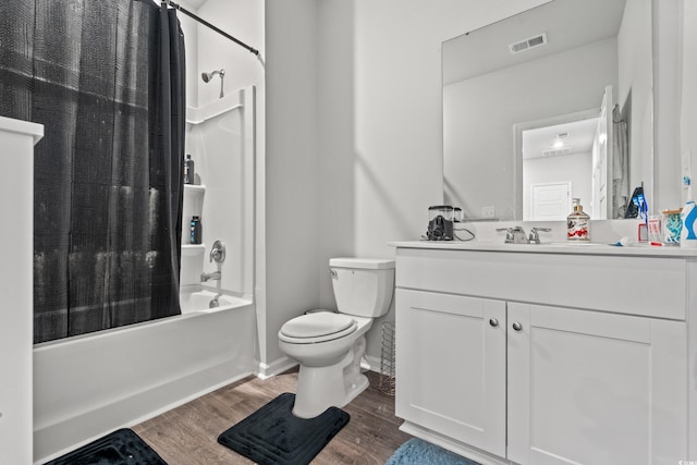 3968 Hibiscus Dr, Little River, SC 29566 - bathroom featuring vanity, shower / bathtub combination with curtain, wood finished floors, and toilet