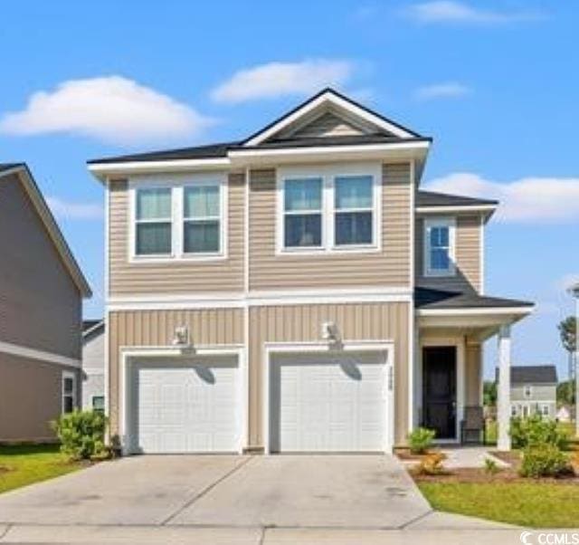 3968 Hibiscus Dr, Little River, SC 29566 - view of front of property with an attached garage and driveway