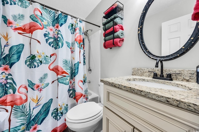 bathroom with vanity, shower / tub combo with curtain, a textured ceiling, and toilet
