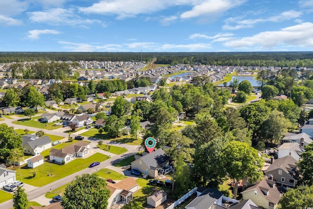 birds eye view of property with a residential view