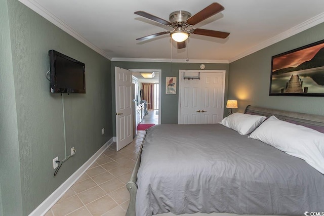 bedroom with a ceiling fan, baseboards, ornamental molding, and light tile patterned floors