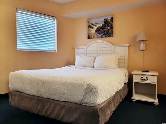 bedroom featuring carpet