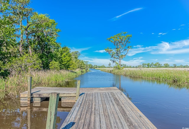 view of dock featuring a water view