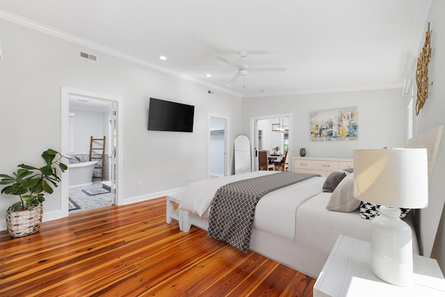 bedroom featuring visible vents, ornamental molding, wood finished floors, and recessed lighting