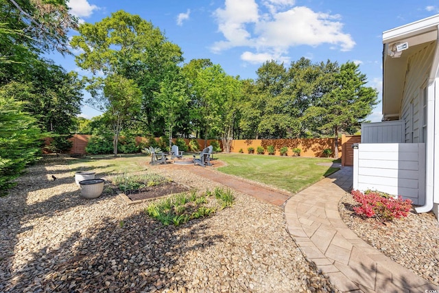 view of yard with a patio and fence