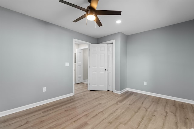 unfurnished bedroom with ceiling fan, baseboards, light wood-type flooring, and recessed lighting