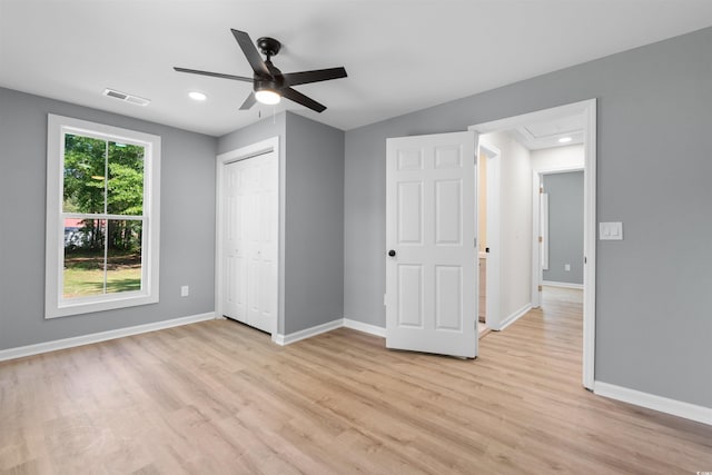 unfurnished bedroom featuring visible vents, recessed lighting, light wood finished floors, a ceiling fan, and baseboards