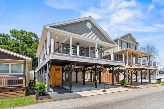 6001-5432 S Kings Hwy, Myrtle Beach, SC 29575 - view of front of home featuring a ceiling fan and stairs