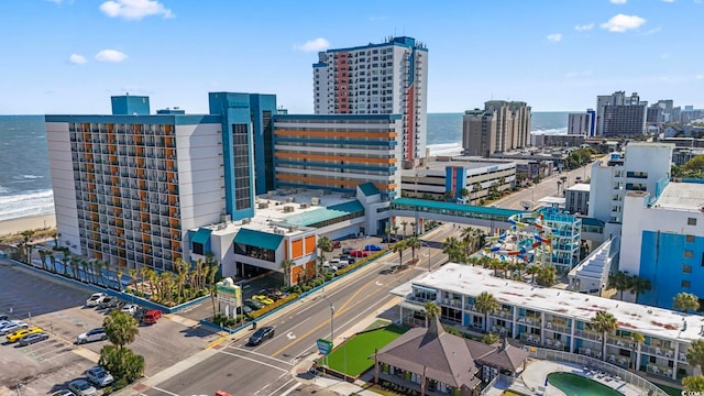 aerial view with a water view and a view of city